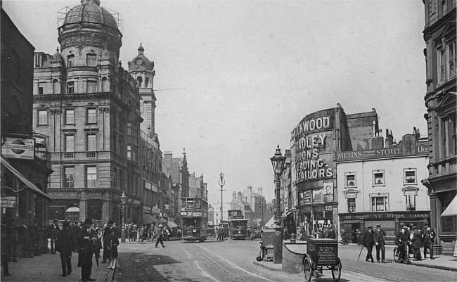 Upper street, Islington - the Angel on the left, and the Blue Coat Boy to the right - circa 1920