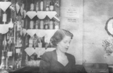 the photos are of me sitting on the bar and my Aunt behind the bar Circa 1950.