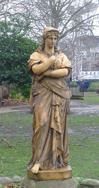 The façade of the pub featured large terracotta figures of the nine muses. One, Euterpe, the Muse of Instrumental Music, survives and can be seen in St George’s Gardens, near Kings Cross railway station - in 2014