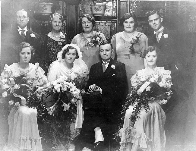 My Mother and Father (John and Margery) on their wedding day in 1934 at the Parrs Head, and with my Grandmother just behind.